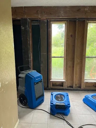Air mover drying a League City room after a water loss