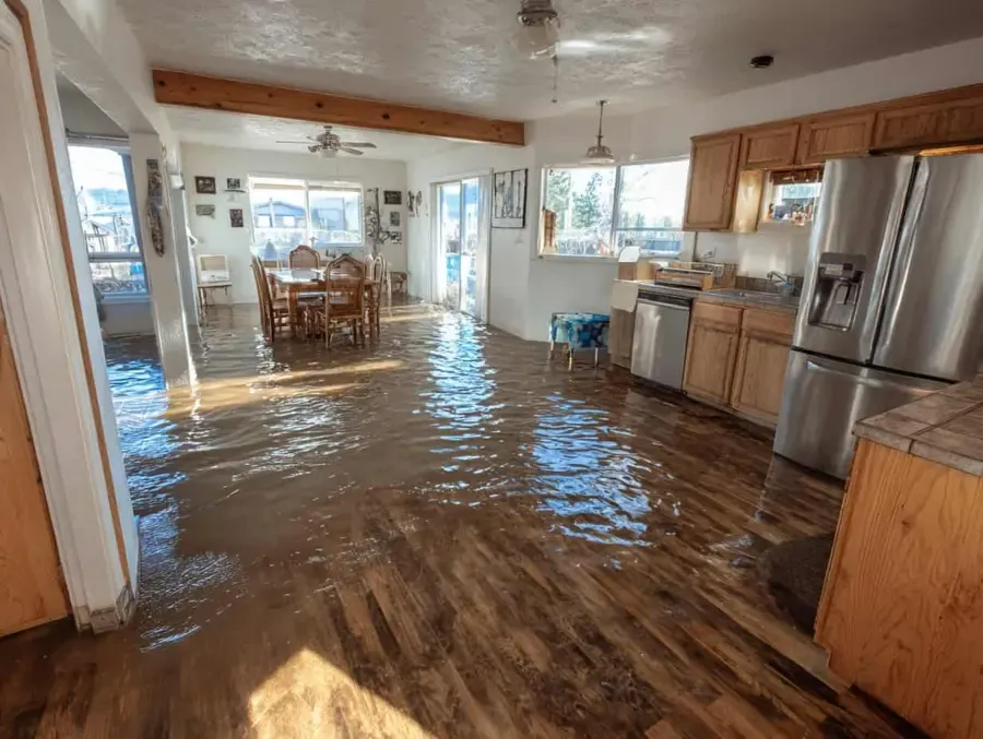 Storm floodwater standing inside a League City home after a Gulf storm